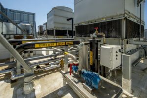 Industrial cooling tower system for process water temperature regulation